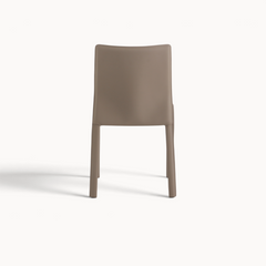 Aika Aki eetkamerstoel in taupe kleur met een strak en modern minimalistisch design, achterkant aanzicht.