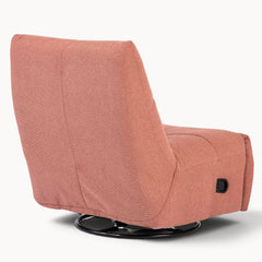 Aika Yasu relaxfauteuil in roze textiel met een zwart metalen draaivoet, gezien vanaf de achterkant.