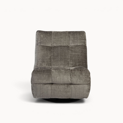 Aika Nagomi relaxfauteuil in grijs fluweel met een gewatteerd blokpatroon en een draaibare voet