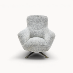 Aika Yume draaibare fauteuil met een wit en zwart gestructureerd stoffen bekleding en een modern metalen onderstel.